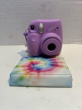 Fujifilm Instax Mini 7+ instant camera in the lavender color
